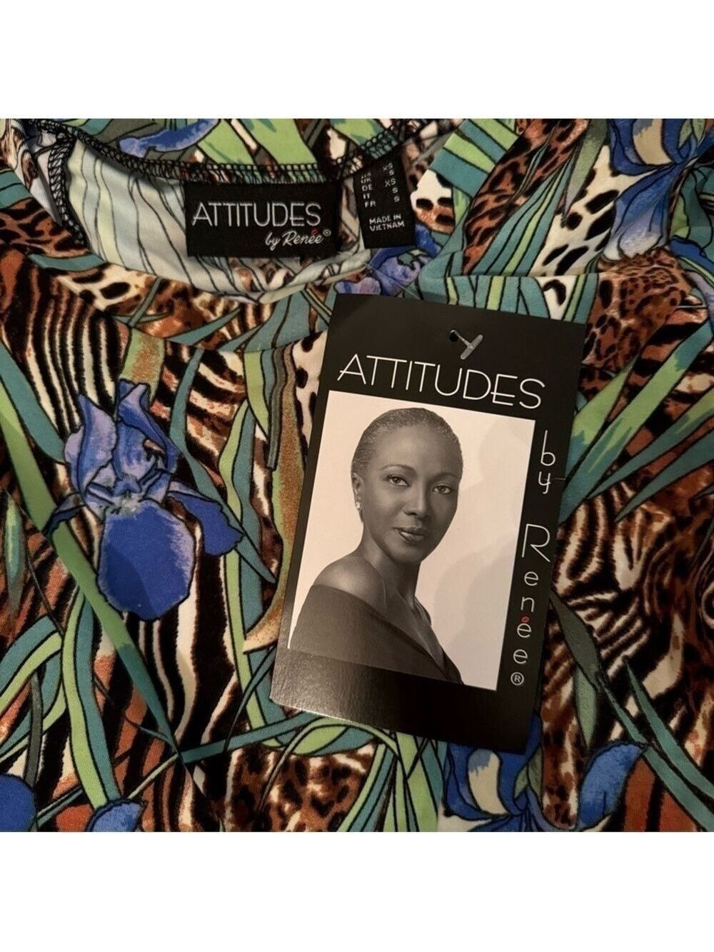 Attitudes by Renee Como Jersey Printed Godet Tunic w/ Pockets. New.
Size XS. - Picture 12 of 14